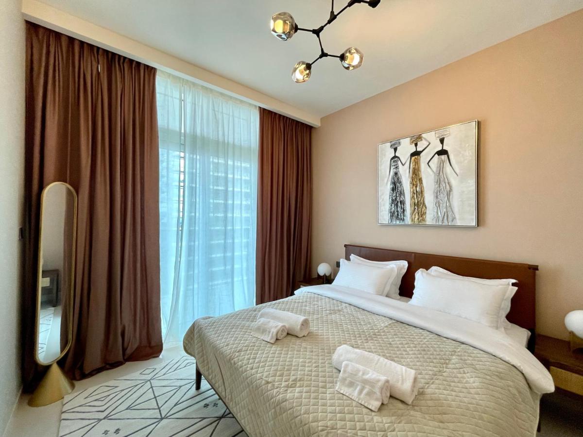 Apartamento Dar Vacation - Luxury White & Badge 1bdr Palm View Dubai