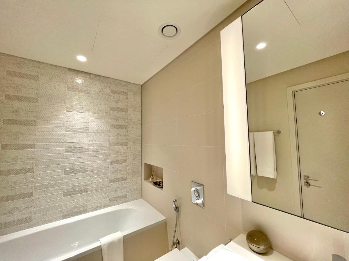 Apartamento Dar Vacation - Luxury White & Badge 1bdr Palm View Dubai