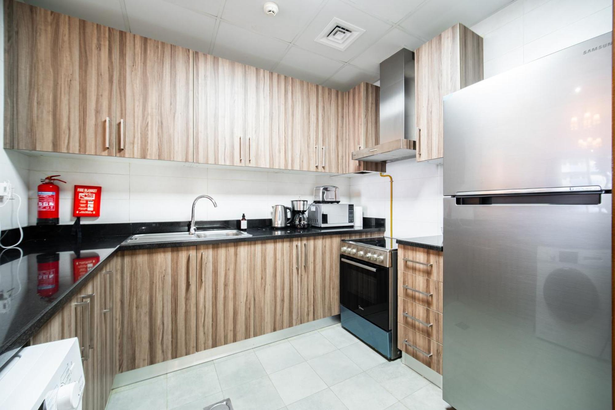 Elegant Escapes - Homely 1b In Dunya Tower Apartamento *