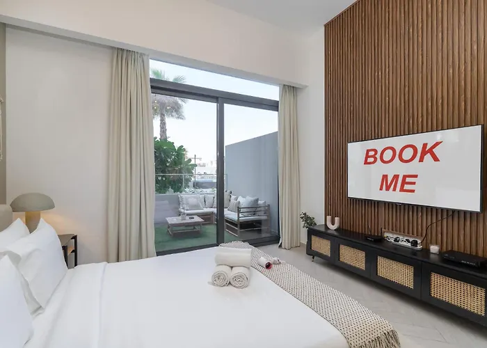 Minimalist Studio With Nature-Inspired Balcony In Jvc