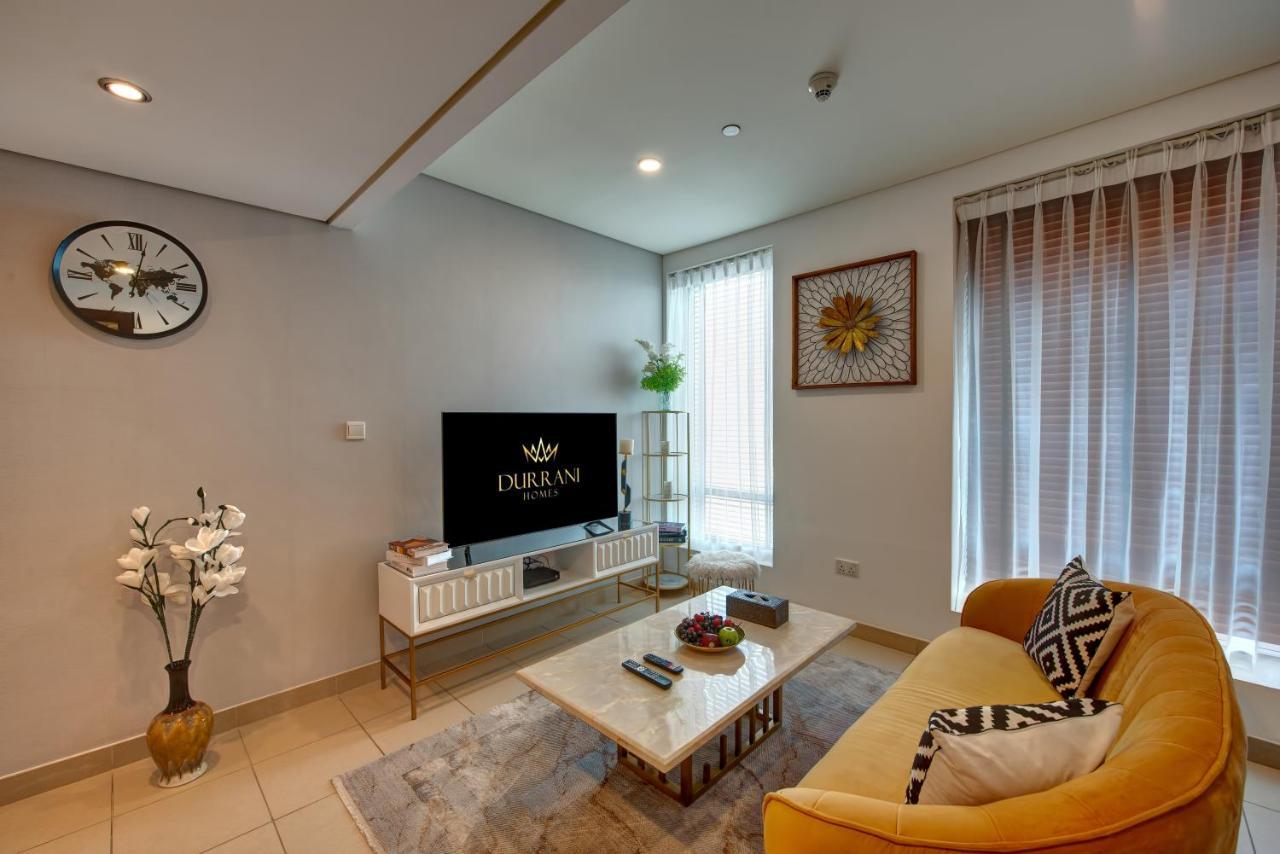 Durrani Homes - Iconic Burj Views Living Dubai