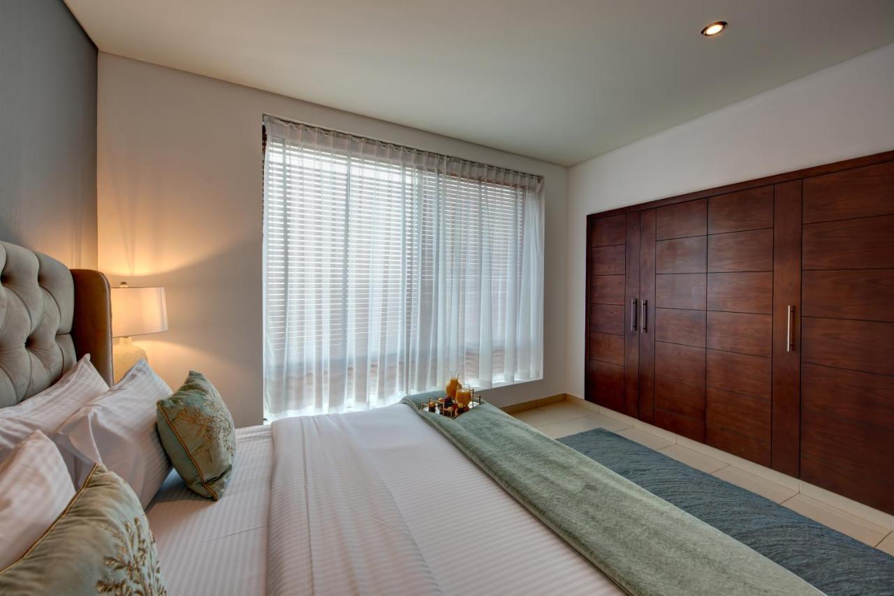 Durrani Homes - Iconic Burj Views Living Dubai