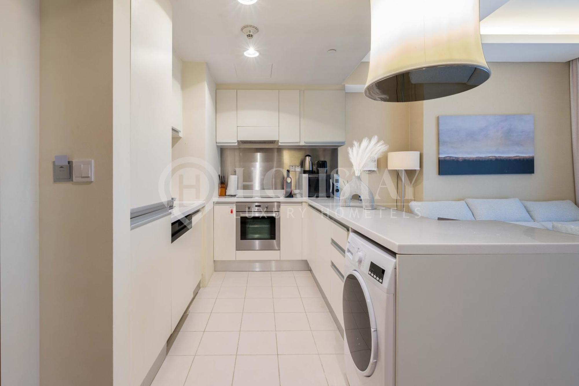Holistay Luxury Homes - Burj Khalifa View - Direct Access Mall * Dubai