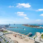 Fam Living - Beachfront Getaway In Emaar Beachfront - Private Beach Access And Luxury Amenities