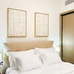 Waterfront Apartment With Burj Khalifa Views In Business Bay