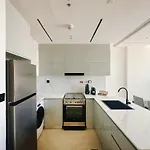 Waterfront Apartment With Burj Khalifa Views In Business Bay