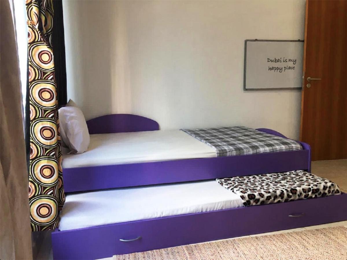 Octavius Home, Large 2 Bedroom Near Global Village & Outlet Mall * Dubai