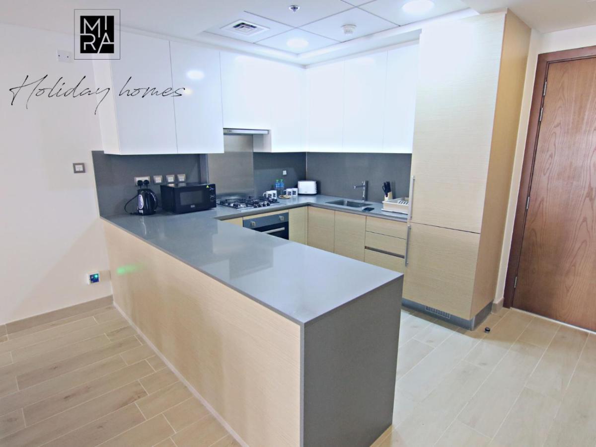 Apartment Mira Holiday Homes - Lovely 2-Bedroom Serviced Apartment With Free Beach Access - Azizi Mina Dubai