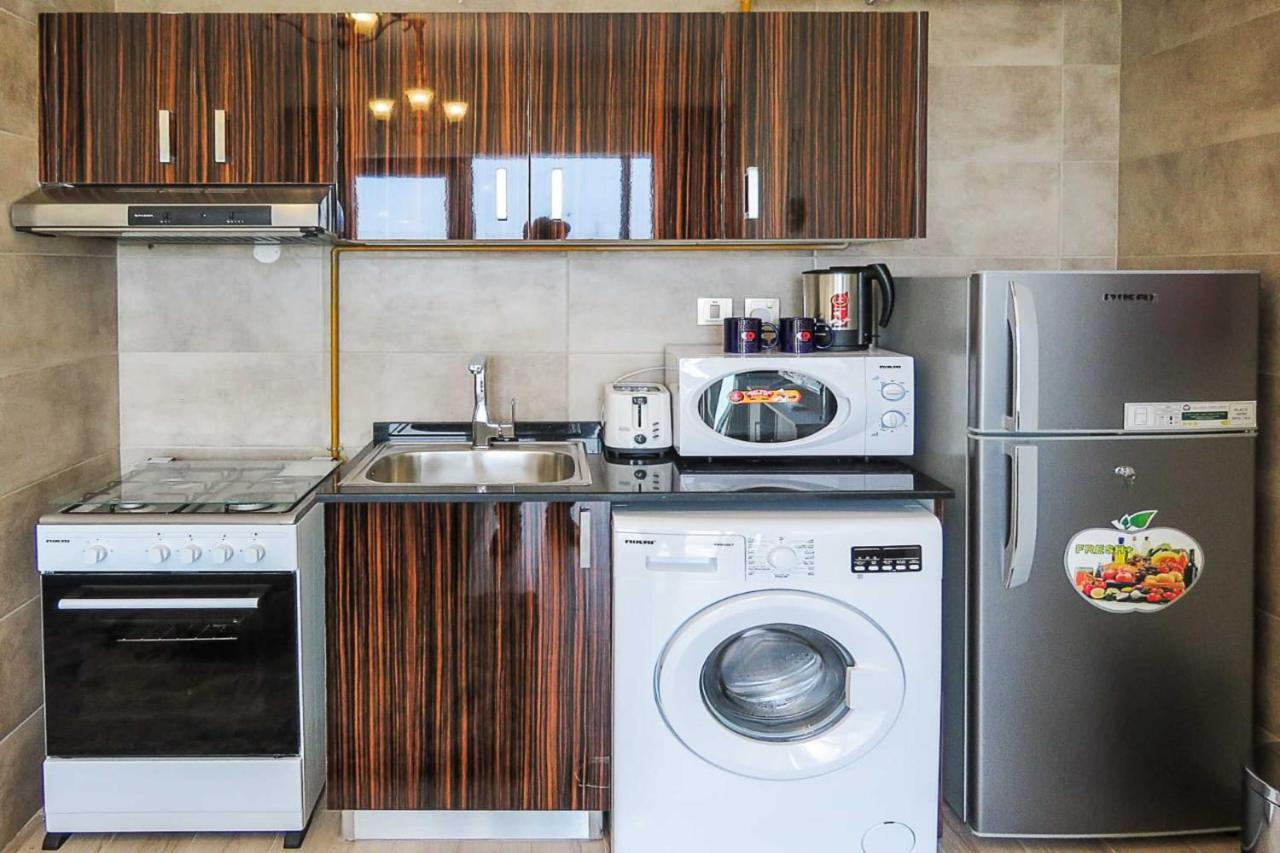 Oyo 860 Studio Apartment, Maya Tower 4, Jumeirah Village Triangle * Dubai