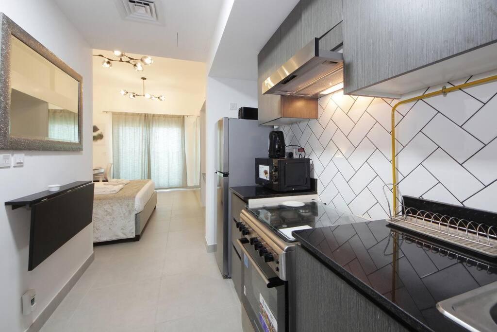 Apartamento Bella Rose Studio Apartment- Al Barsha