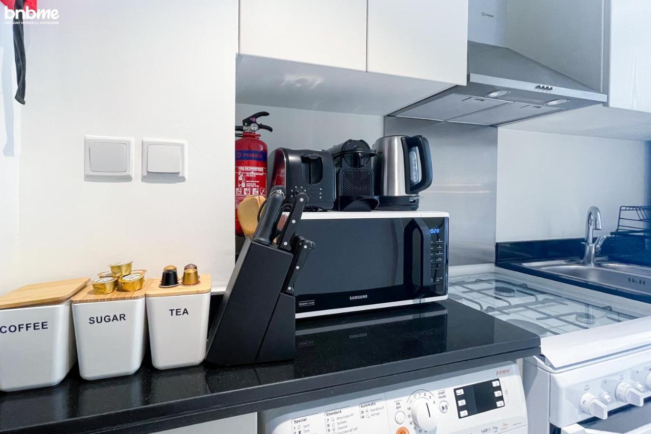 Bnbmehomes - Damac Hills - Carson Tower Apartment *