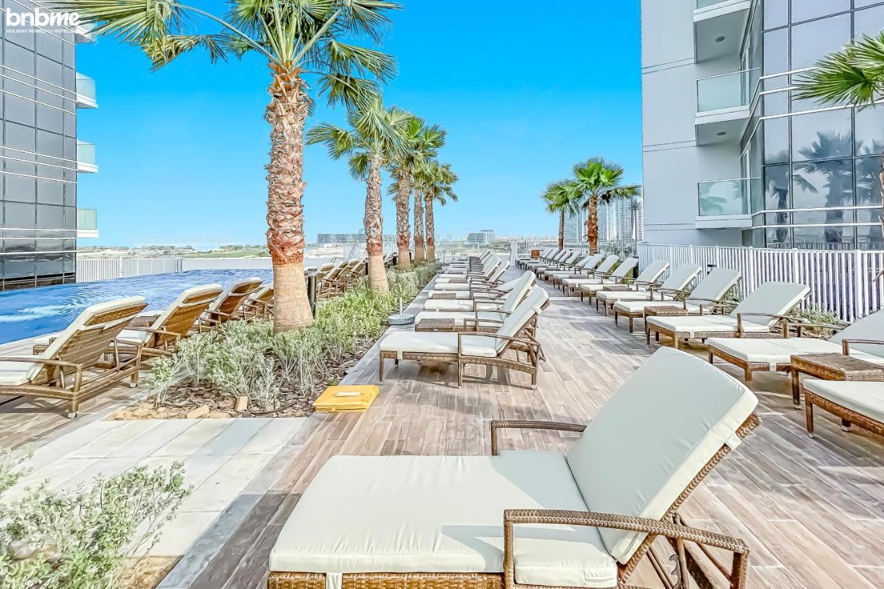 Bnbmehomes - Damac Hills - Carson Tower Apartment Dubai