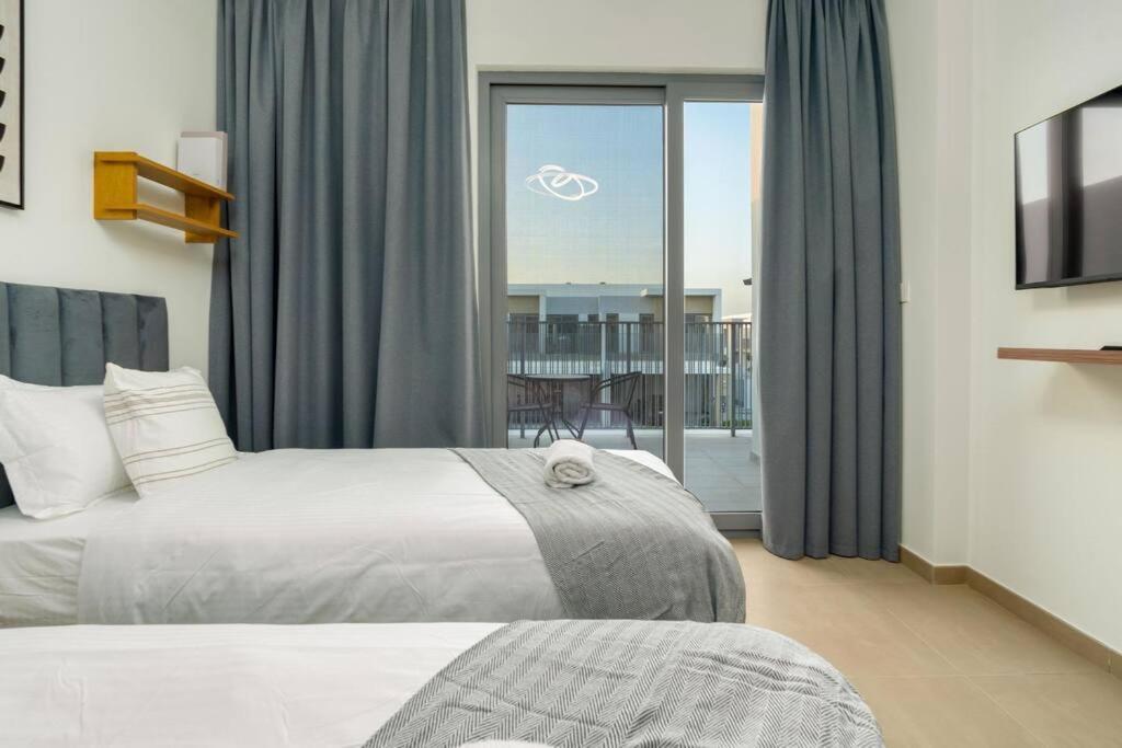 3 Bedrooms In Tilal Al Ghaf Apartment Dubai