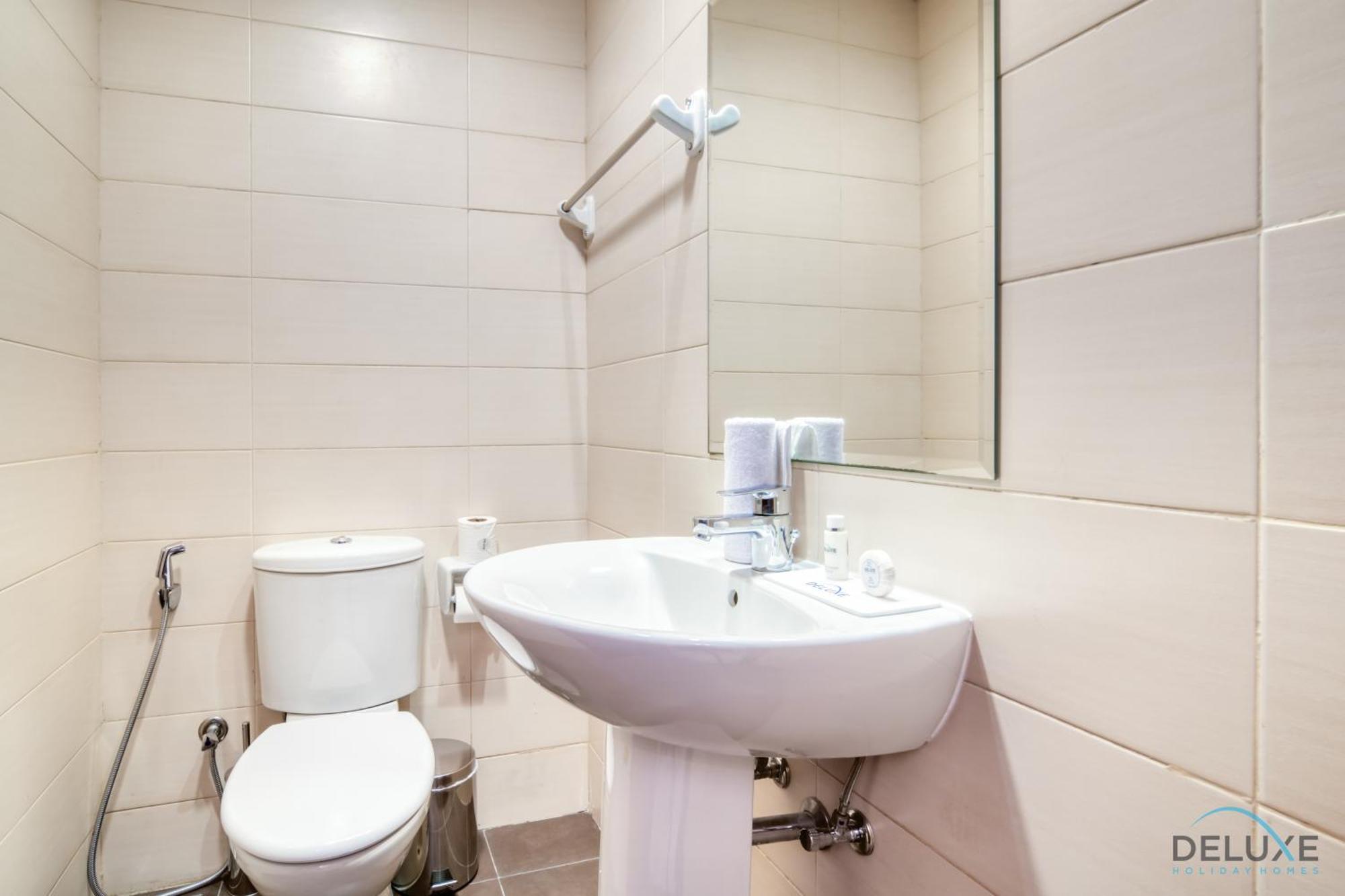 Striking 1br At Elite 8 Sports Sports City By Deluxe Apartment