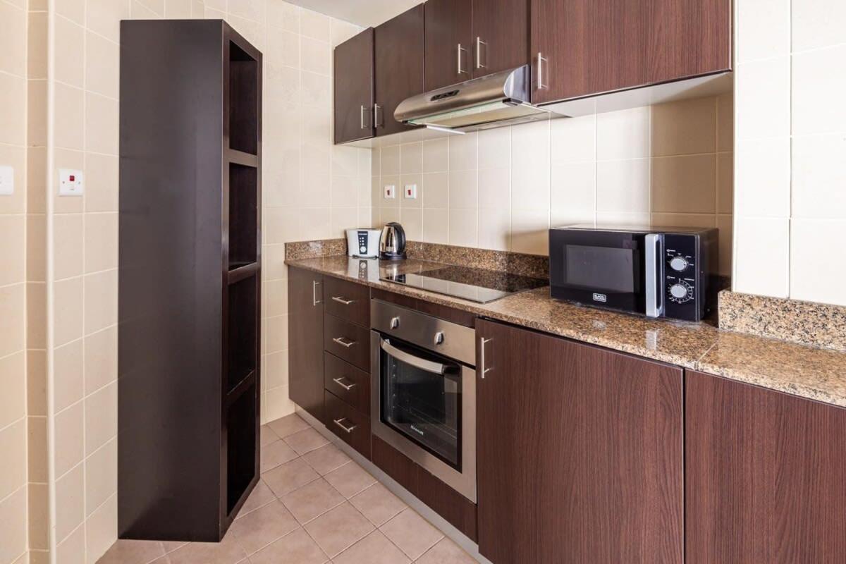 Frank Porter - Torch Apartment Dubai