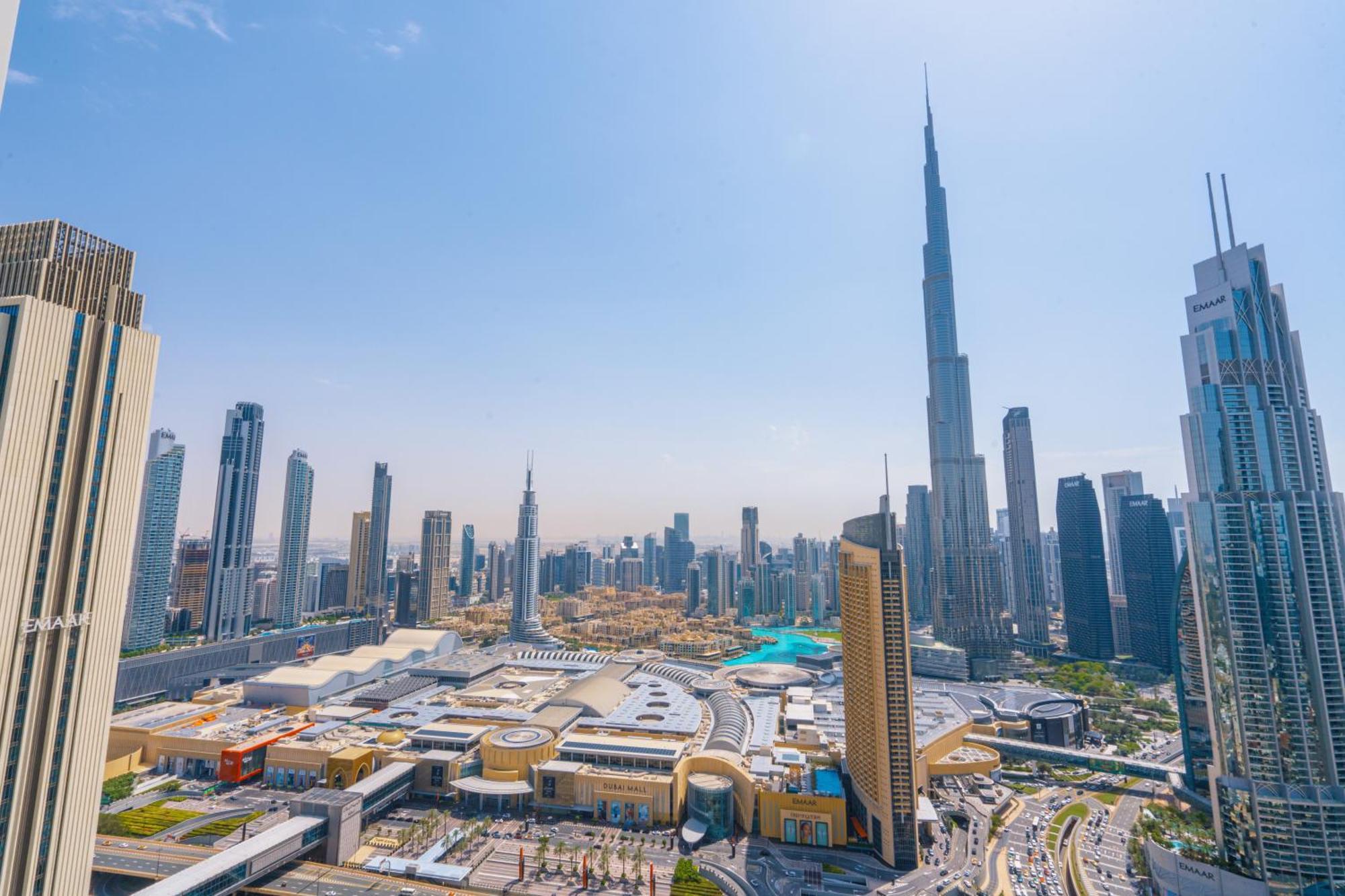 Elegant Escapes - 3b Burj View, Direct Mall Access Apartment Dubai