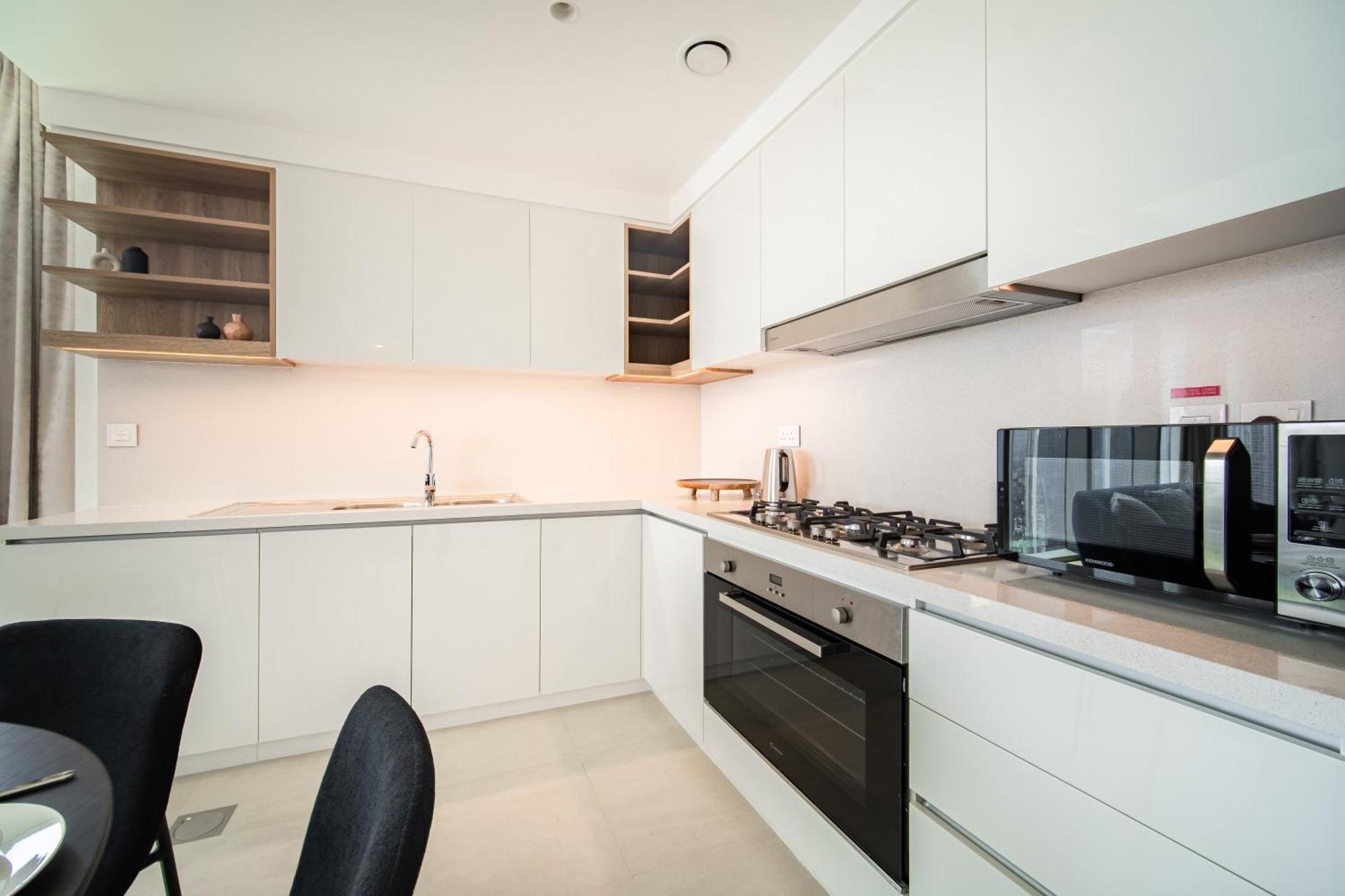 Elegant Escapes - 3b Burj View, Direct Mall Access Apartment