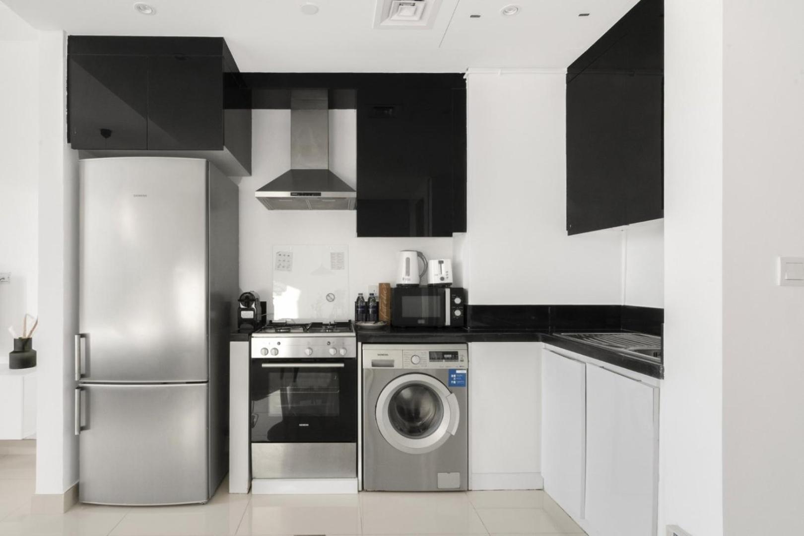 Guestready - Modern Grey With Pool And Gym Apartment Dubai