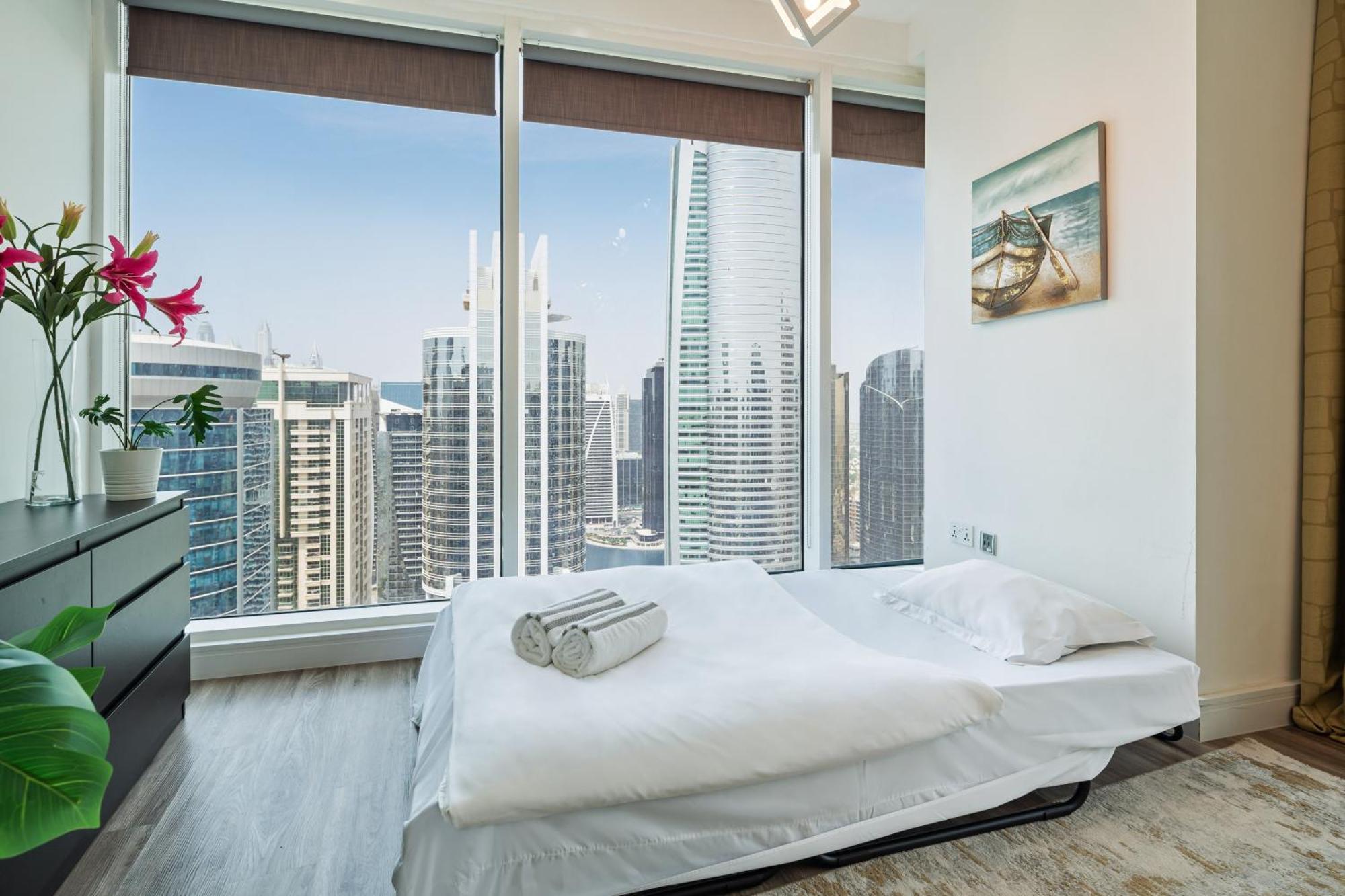 Modern & Spacious 2-bed With Panoramic Views, Dual Balconies, Steps From Jlt Metro By 