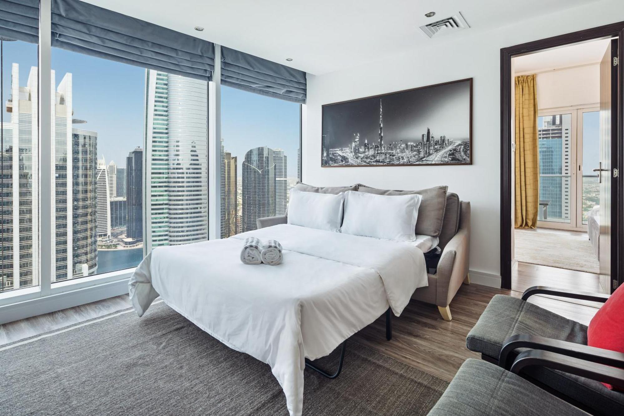 Modern & Spacious 2-bed With Panoramic Views, Dual Balconies, Steps From Jlt Metro By 