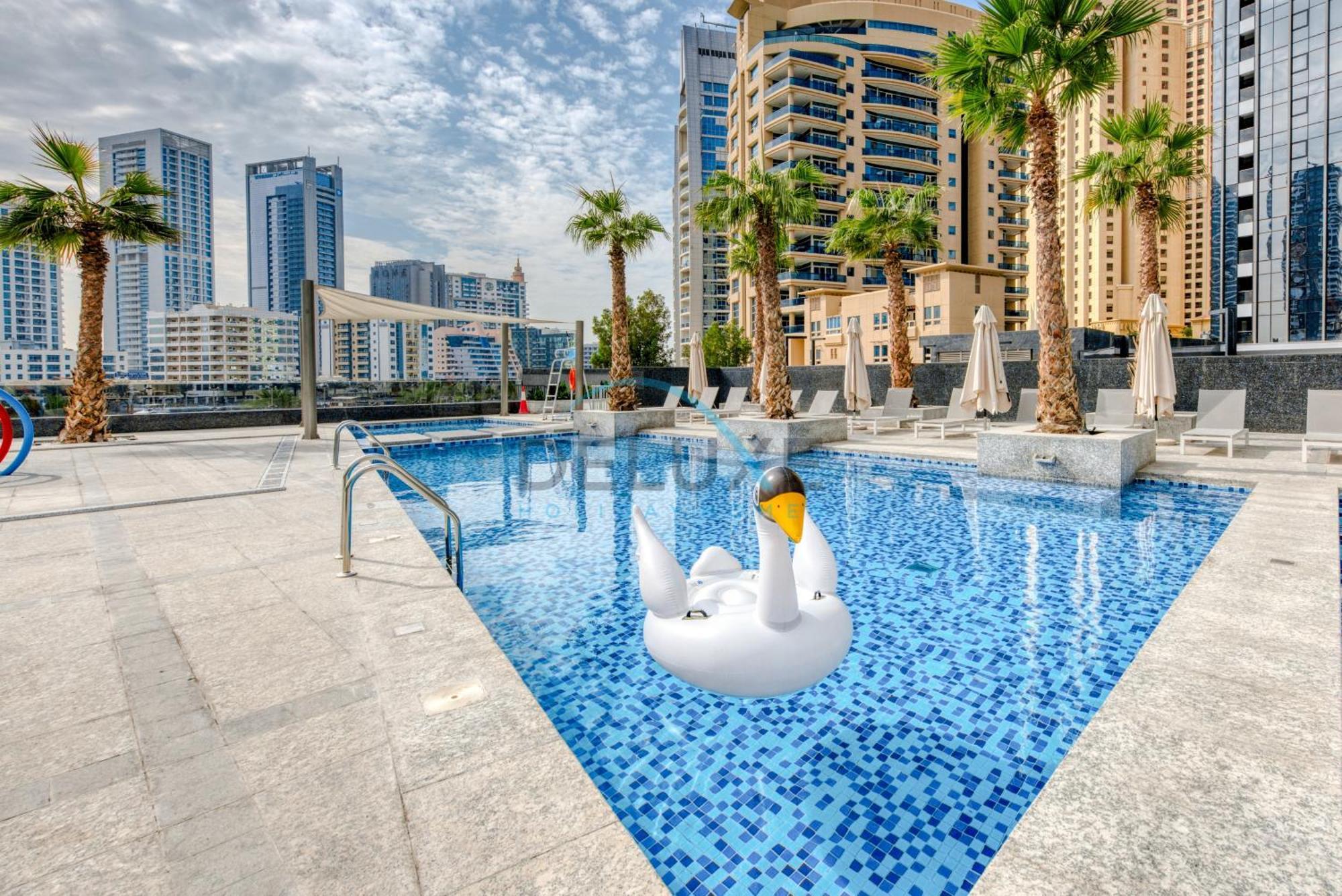 Cozy 1br Getaway In Sparkle Tower 3, Marina Buy Deluxe Homes Apartment