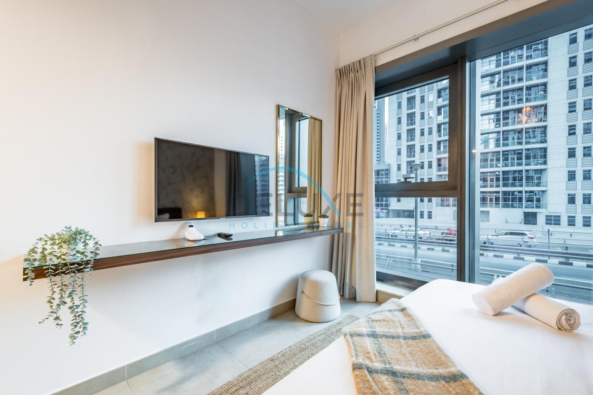 Cozy 1br Getaway In Sparkle Tower 3, Marina Buy Deluxe Homes Apartment