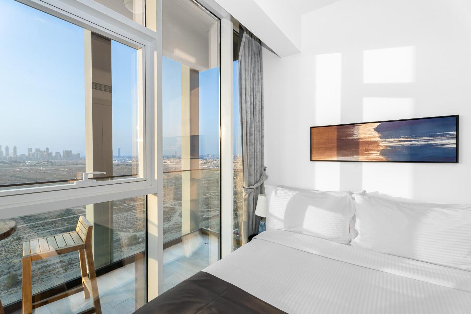 Apartment Escape24 Modern Bloom Tower Jumeirah Village Circle Jvc Dubai