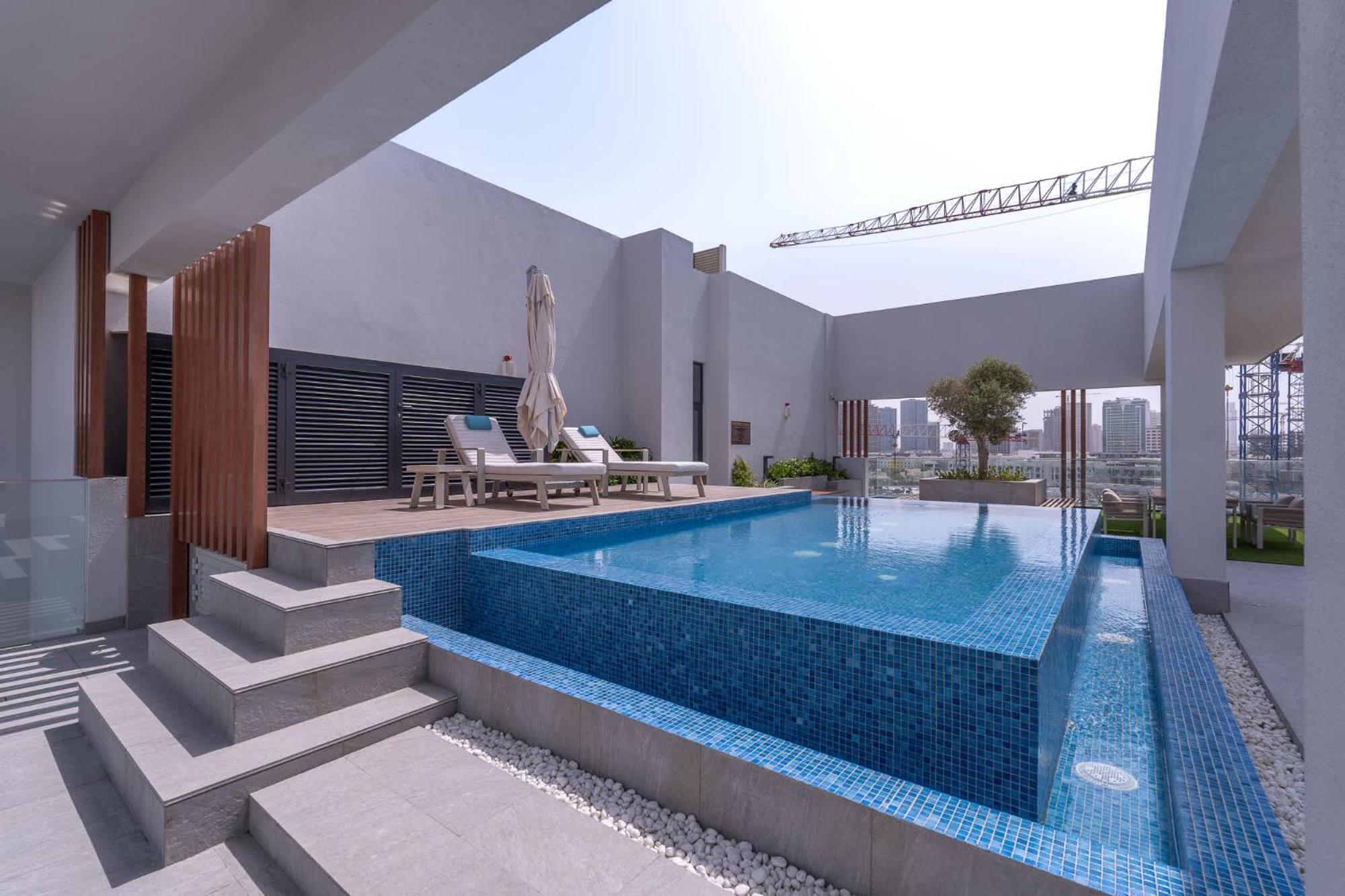Minimalist With Nature-inspired Balcony In Jvc Apartment Dubai