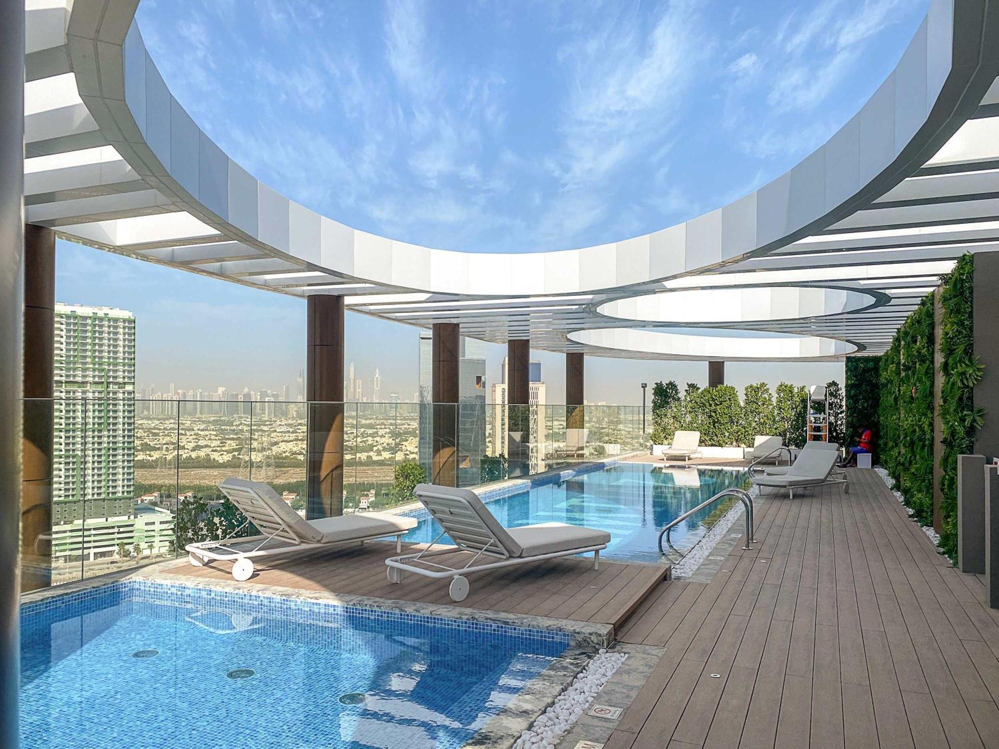 Modern With Rooftop Pool And Gym In Jvc * Dubai