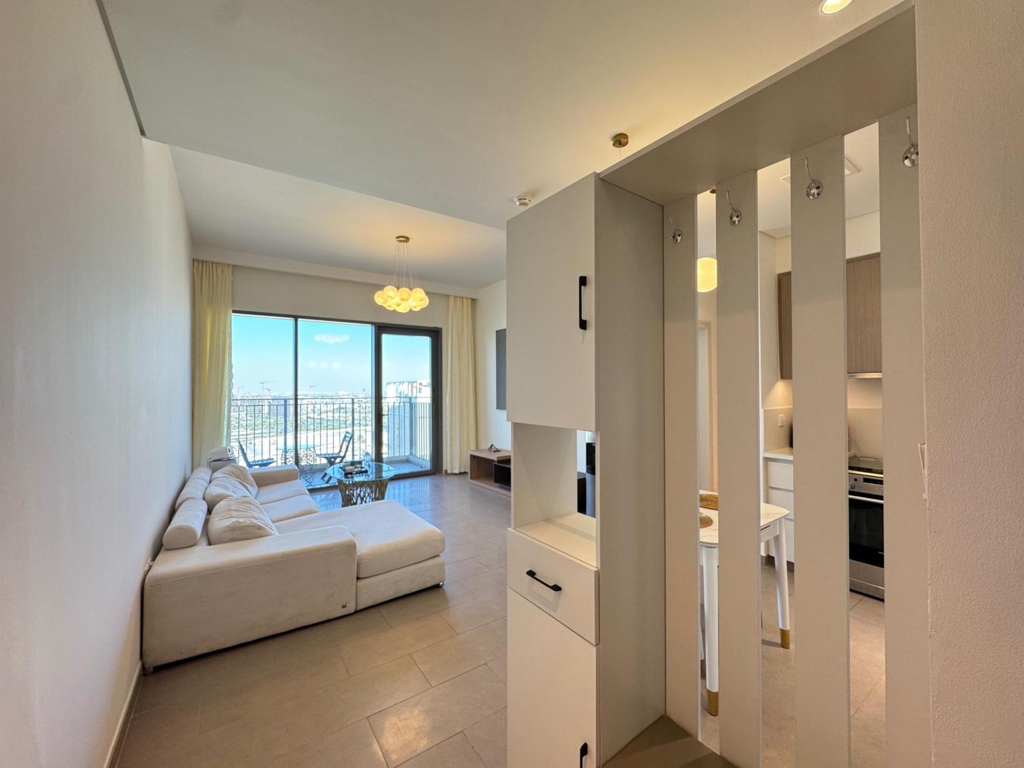Modern 1br In Hills With Big Screen Experience Apartment Dubai
