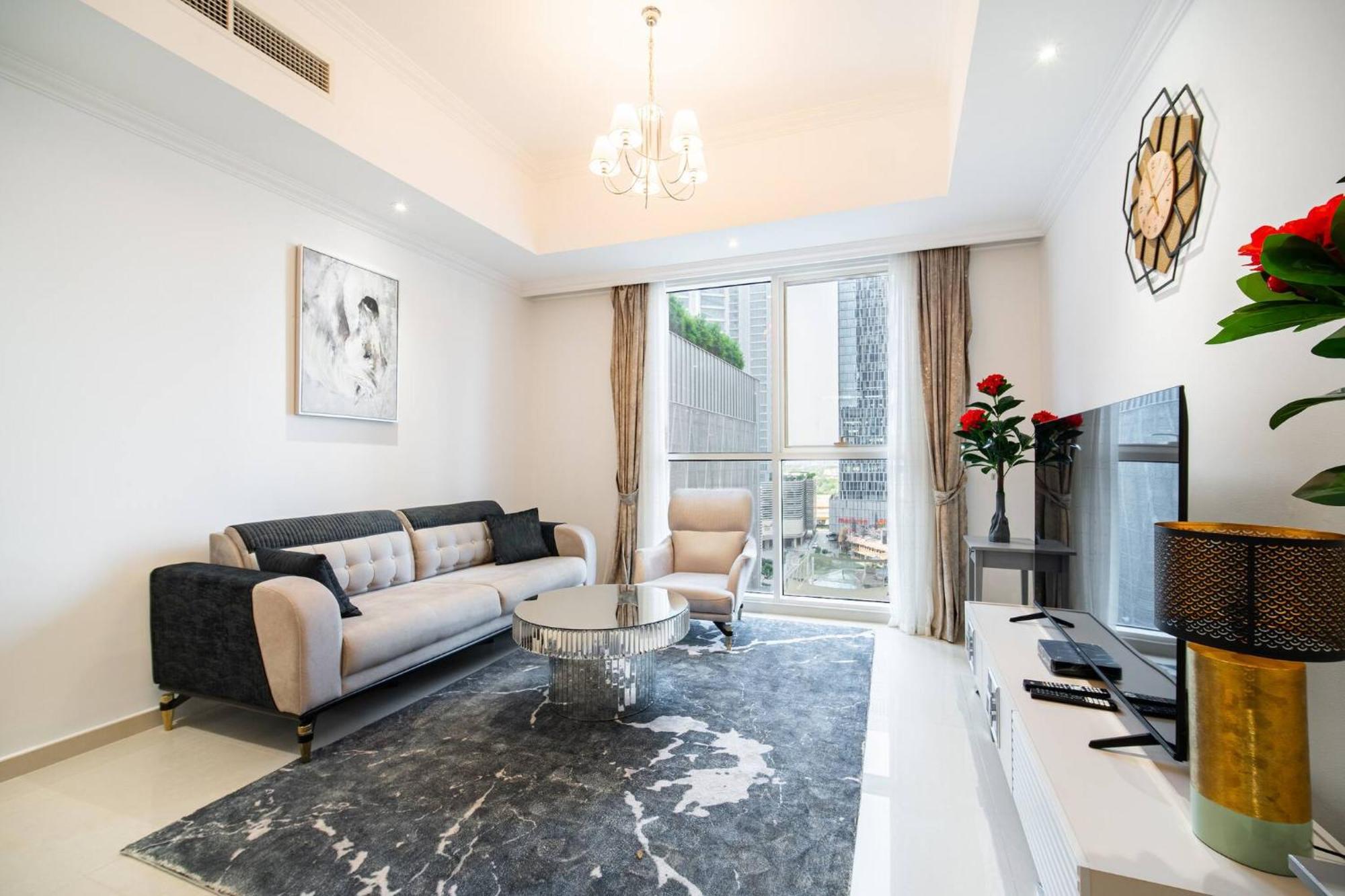 Elegant Escapes - Homely 1b In Dunya Tower Apartamento Dubai