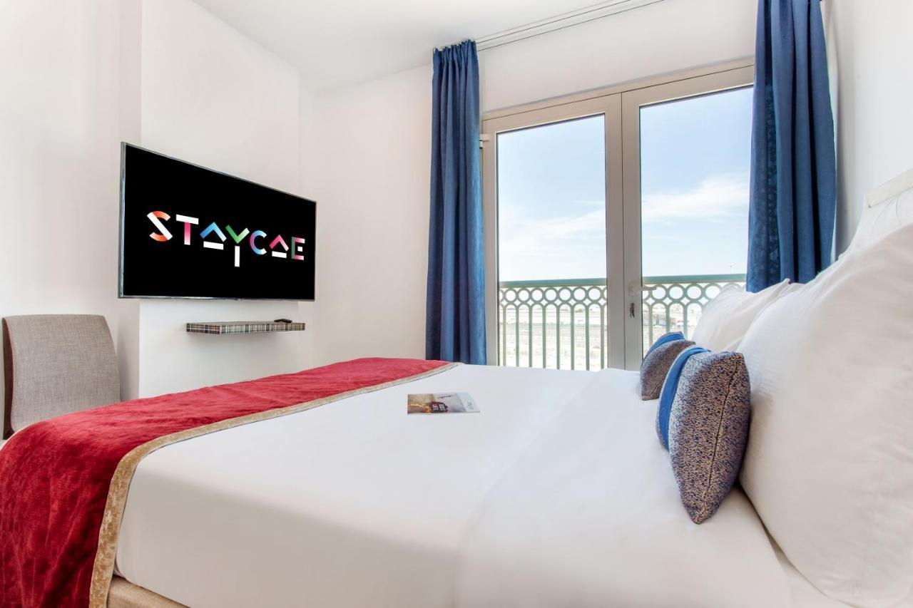 Staycae Homes - Suburbia Apartment Dubai