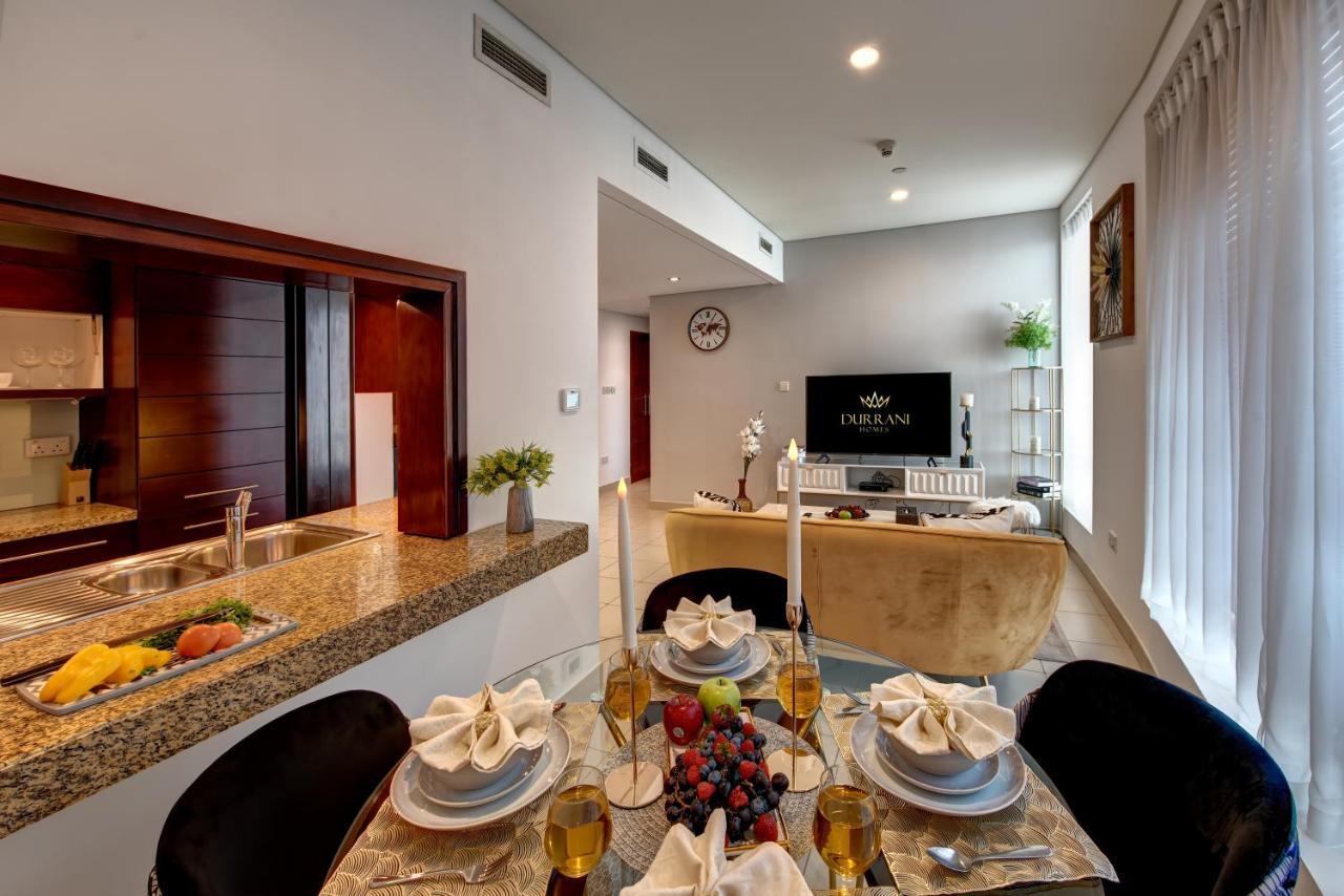 Durrani Homes - Iconic Burj Views Living Dubai