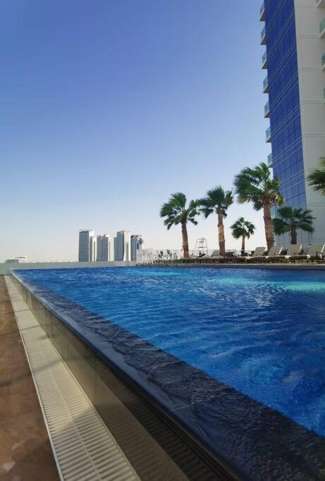 Gharfar 31715 Serene Teal Theme-high Floor-pool Apartment