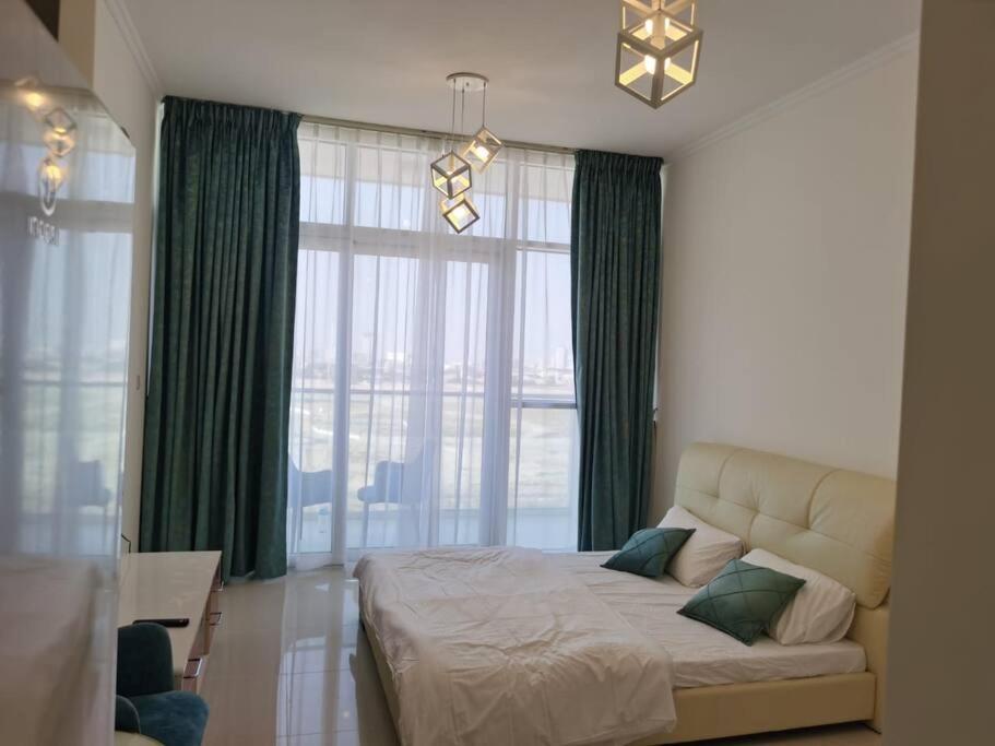 Gharfar 31715 Serene Teal Theme-high Floor-pool Apartment Dubai