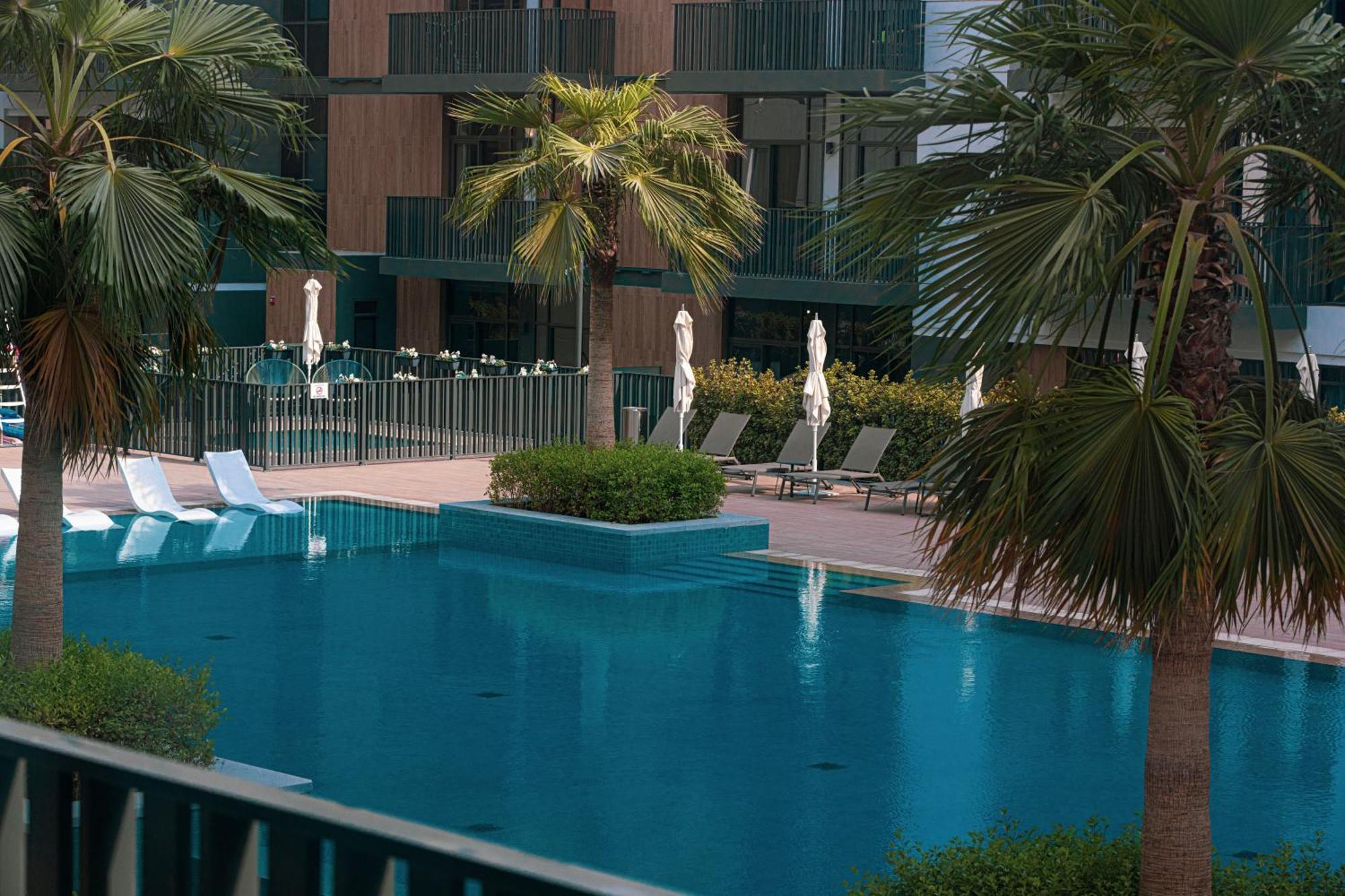 Sophisticated 1br With Pool View In Belgravia Square Jvc Dubai