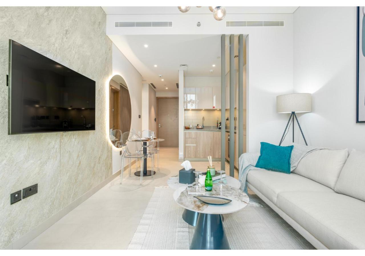 Charming 1br With Cozy Balcony At Sobha Waves By Vibel Apartment