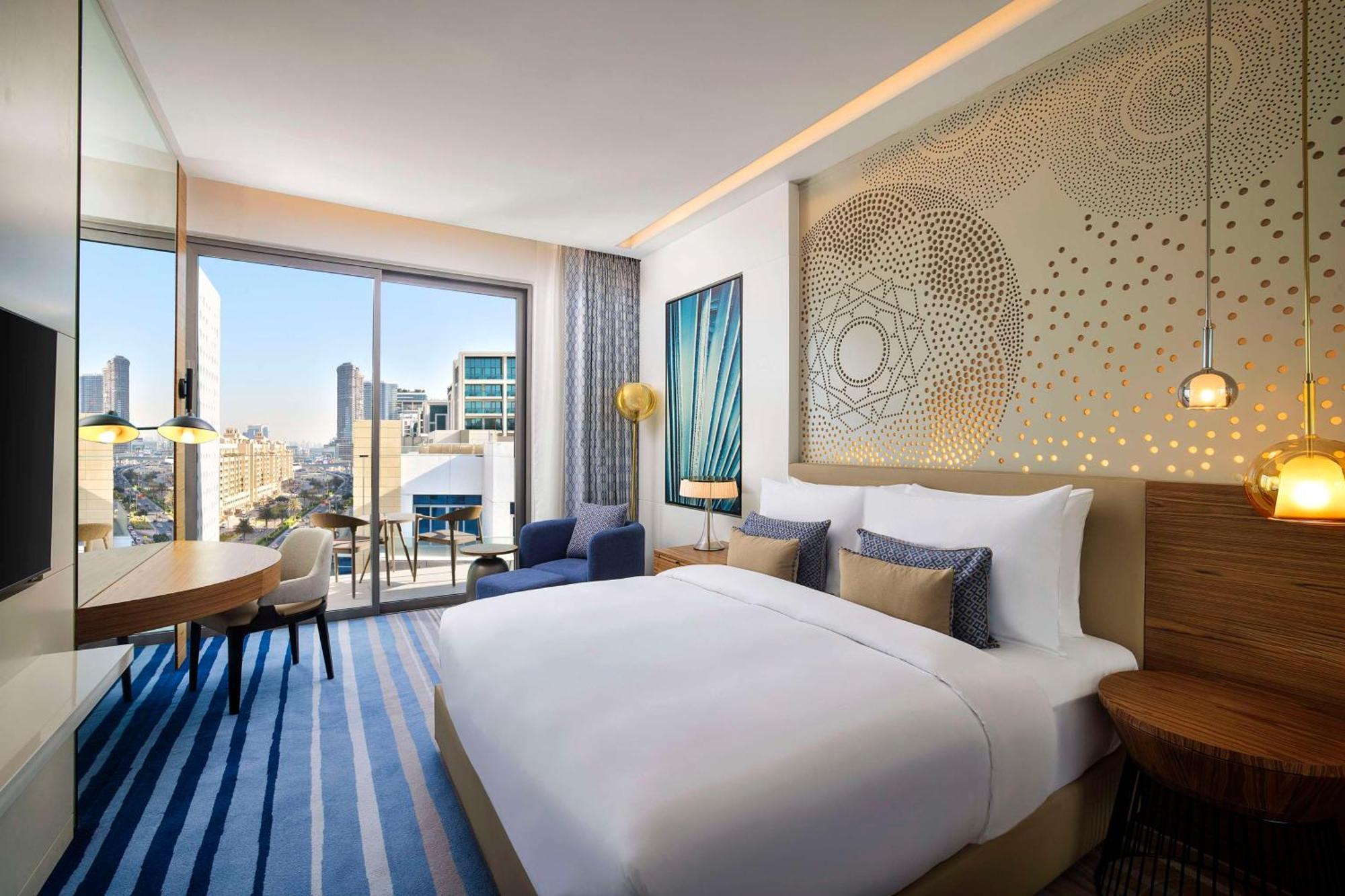 Tumbi West Palm Dubai,tapestry Collection Hilton Hotel Dubai