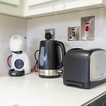 Warm 2-Bedrooms With Modern Kitchen Interior In The Greens!