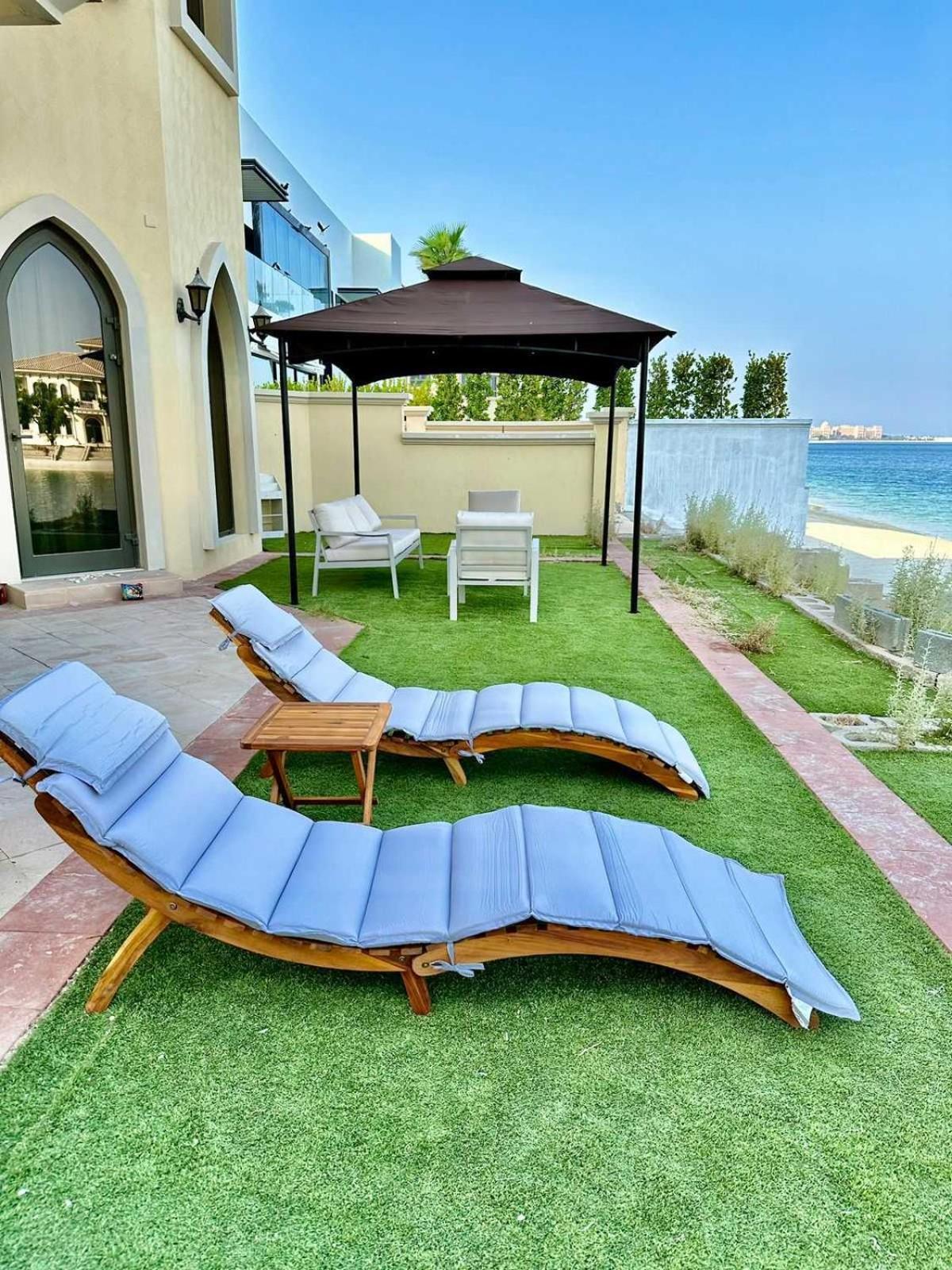 Palm Jumeirah - 4br - Private Beach - Cityapartmentstay Casa de férias Dubai